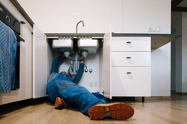 Professional Drain Cleaning technician working in Lamar, AR